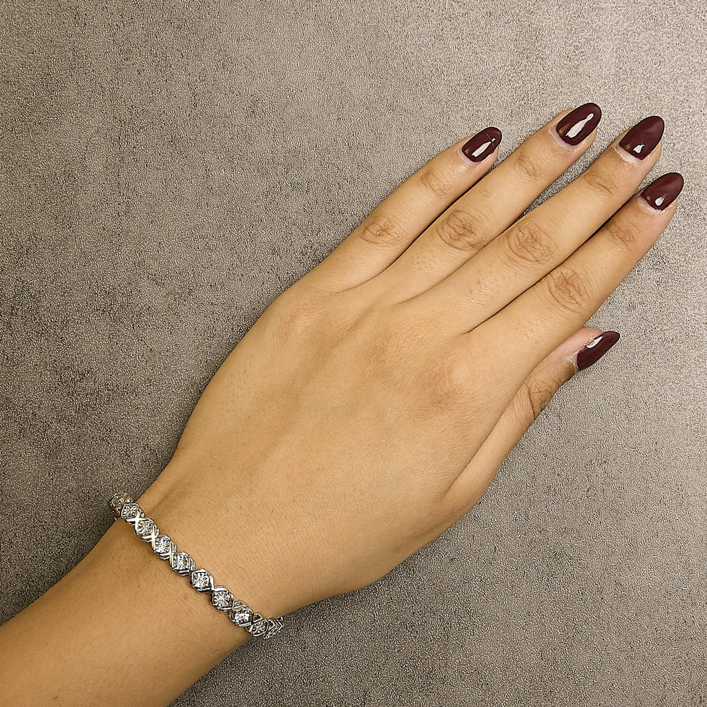 .925 Sterling Silver 1/10 cttw Miracle-Set Round-Cut Diamond "X" Link Tennis Bracelet (I-J color, I2-I3 clarity) - 7.25"