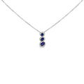 .925 Sterling Silver Created Blue and White Sapphire 3 Stone Swirl Pendant Necklace